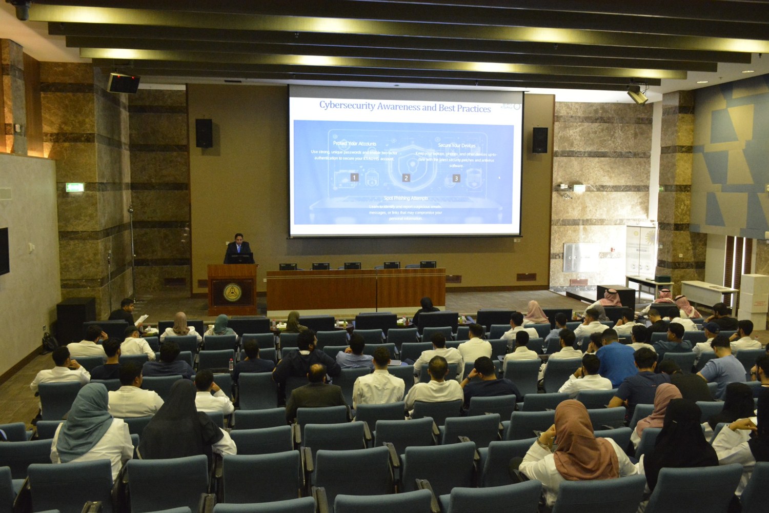 Academic technology presentation in an auditorium